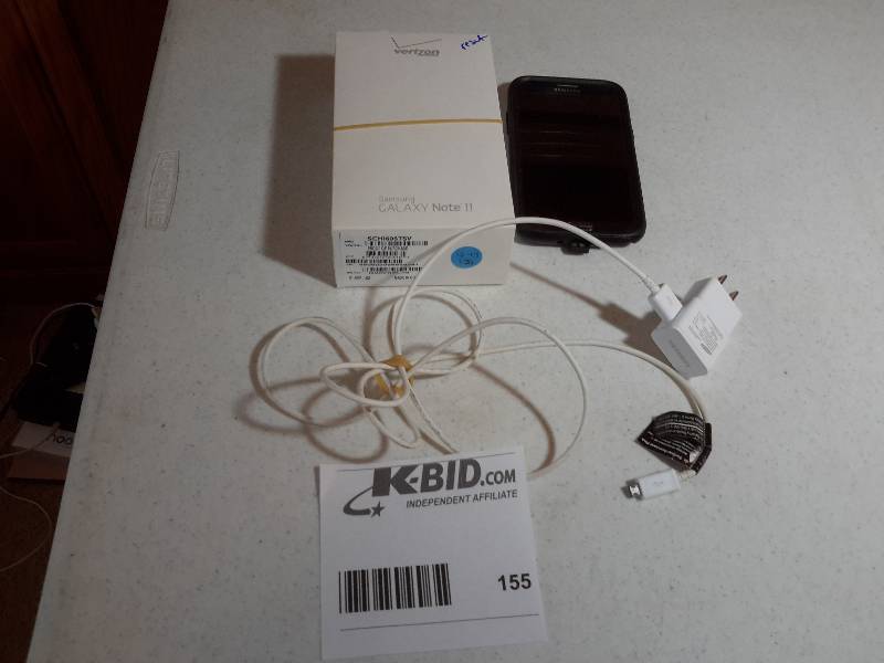 lot 155 image: Samsung Cell Phone.. 16G With Otter cover and charger cord. Clean