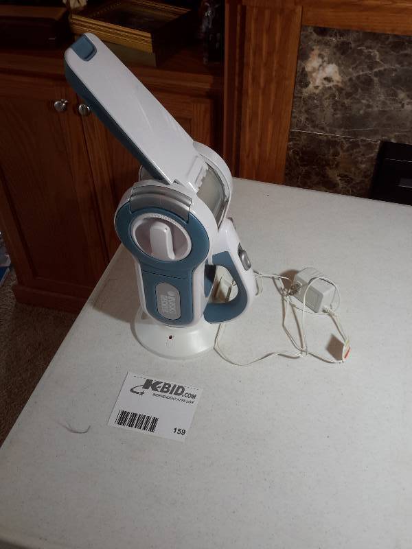 lot 159 image: Cordless portable Vacuum with charging Station