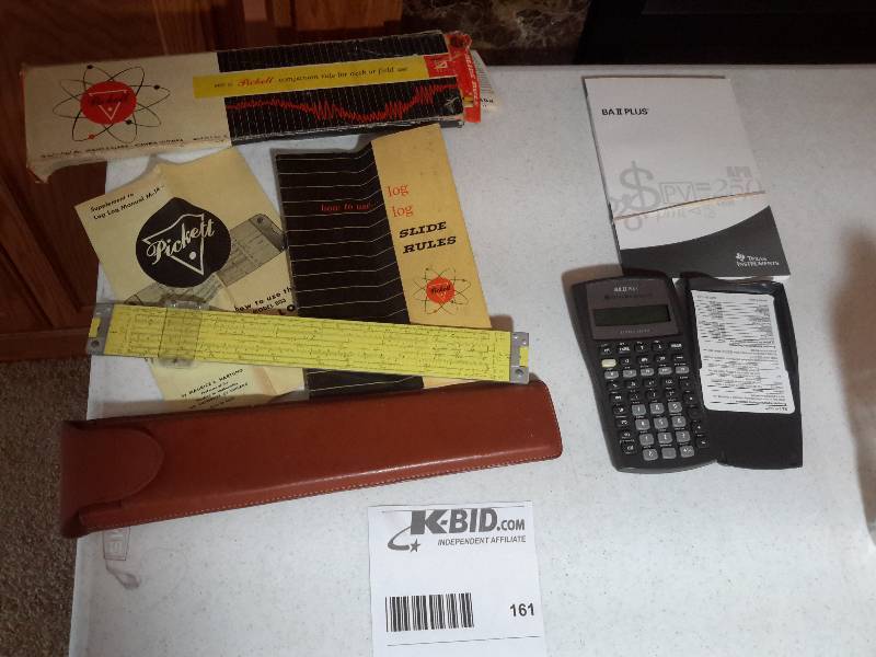 lot 161 image: Picket Slide Rule  Texas Instruments Ba  II  Plus