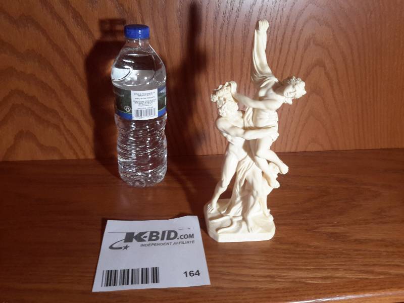 lot 164 image: Small carving..Not sure of material. Looks like Zeus or something and his concubine.. Who knows  HA