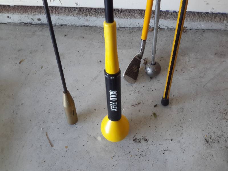 lot 237 image: Misc. Training Golf Clubs.. Whips