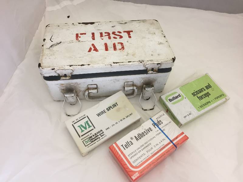 lot 15 image: Metal Handled First Aid Kit Contents