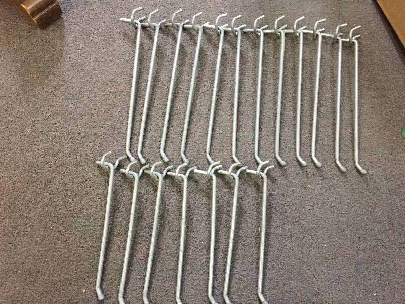 lot 71 image: Display Hardware Metal Prong Pegs 8 & 6