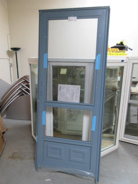 lot 239 image: NEW DELUXE STORM DOOR