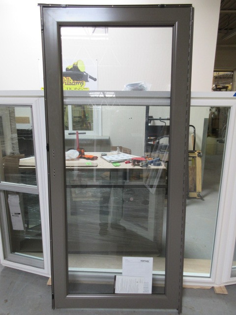 lot 240 image: NEW DELUXE STORM DOOR ONLY