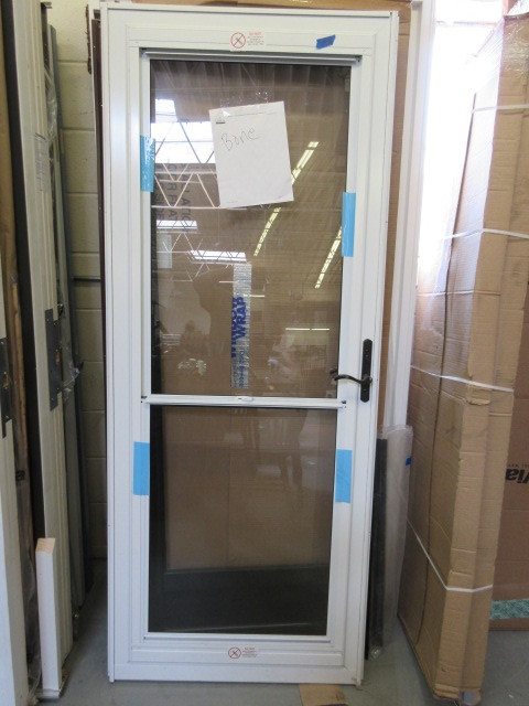 lot 192 image: ALMOST NEW STORM DOOR