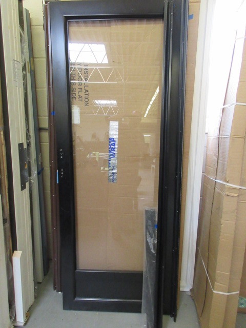 lot 172 image: ALMOST NEW STORM DOOR SLAB