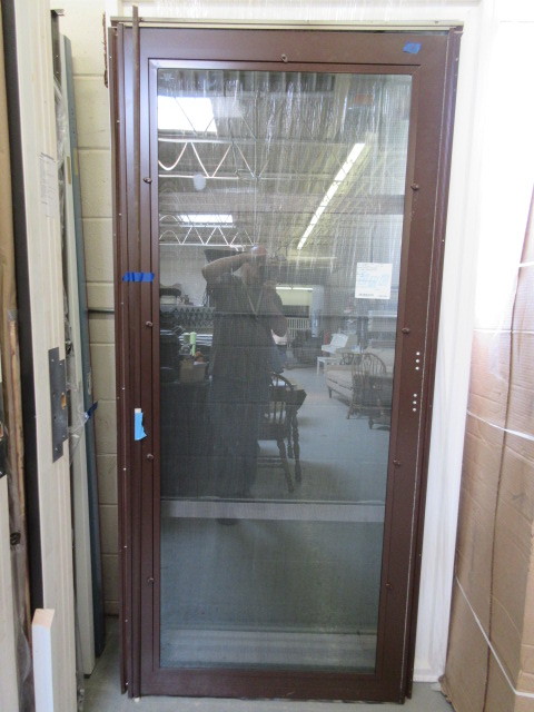 lot 170 image: ALMOST NEW STORM DOOR