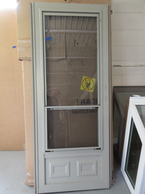 lot 221 image: NEW STORM DOOR
