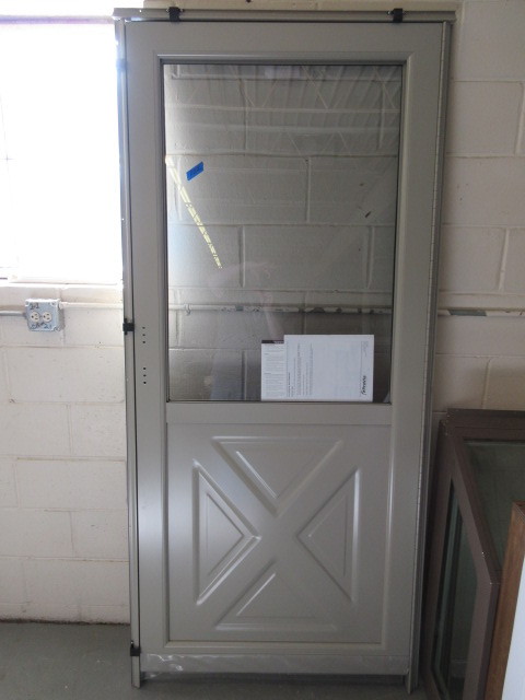 lot 222 image: NEW DELUXE STORM DOOR