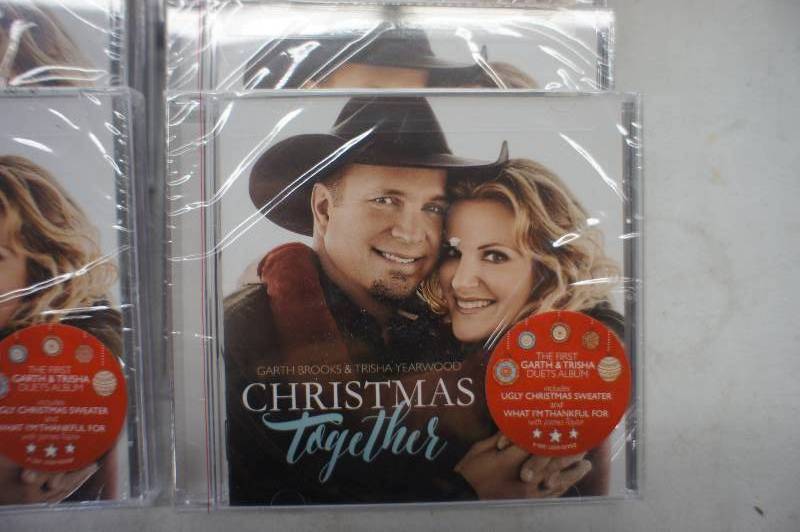lot 73 image: Lot of 10 Garth Brooks and Trisha Yearwood christmas together Album