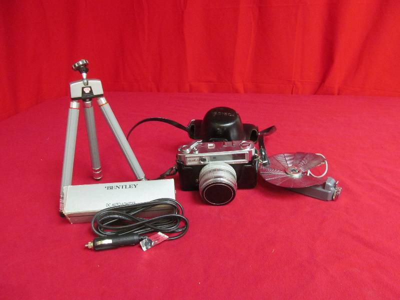 Yashica camera, tripod, dc adapter, Honeywell flash unit