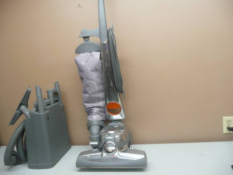 lot 19 image: KIRBY VACUUM WITH ATTACHMENTS - WORKS GOOD, MAY NEED A NEW BELT - COMES WITH CARPET SHAMPOOER - SEE PICTURES