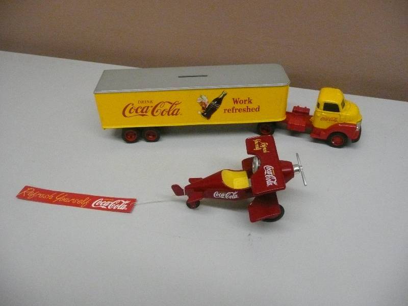 lot 44 image: ERTL Coca Cola, Coke 1950 Cab and Trailer Bank 143 Truck Semi Tractor Yellow Red & Coca Cola plane pedal car - BOTH IN LIKE NEW CONDITION, SEE PICTURES