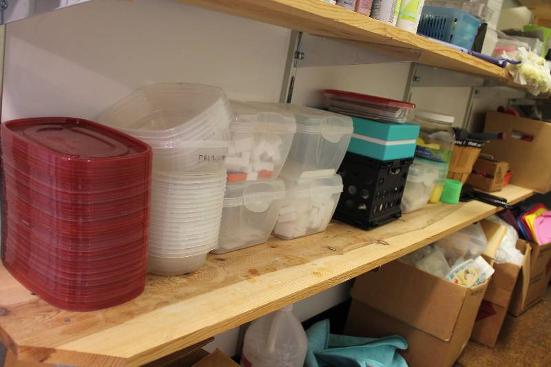 lot 188 image: Plastic Bins w Lids, Buffers, And More