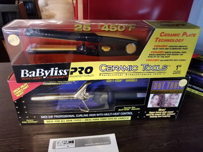 lot 400 image: Lot of (2) Curling Irons - BaByliss Pro Ceramic Tools 1in. Plate, Hot Tools Professional Midi 58in.
