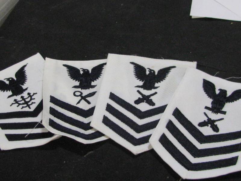lot 52 image: US Navy Rating Badges