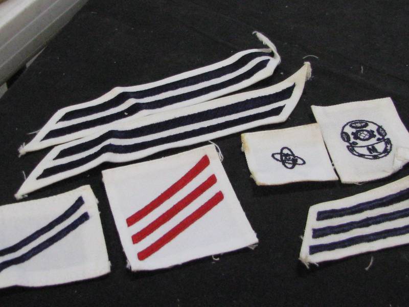 lot 55 image: US Navy Rating Badges