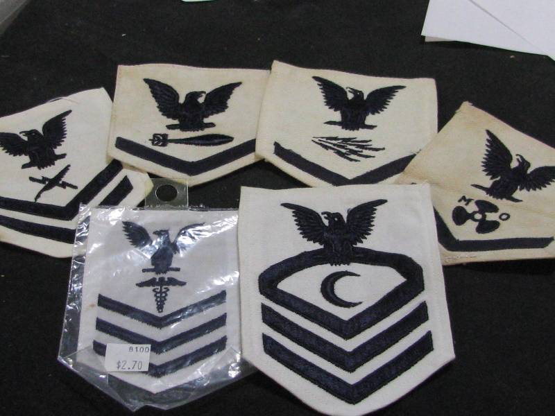 lot 56 image: US Navy Rating Badges