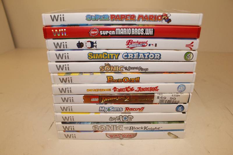 lot 18 image: Lot of 12 Wii Games with many different names please look at the pictures for the names of the games