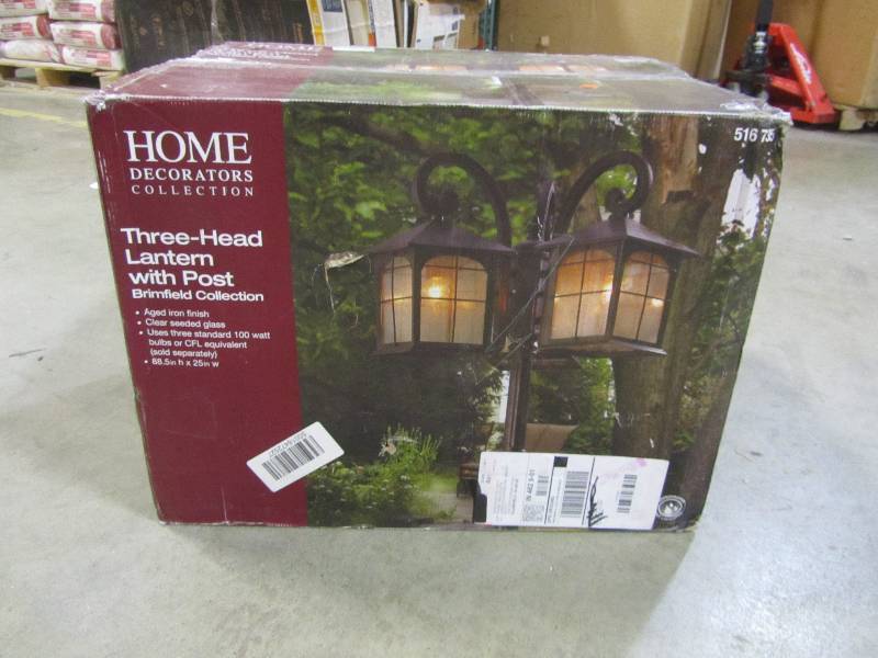 lot 59 image: Home Decorators Collection Brimfield 3-Head Aged Iron Outdoor Post Light