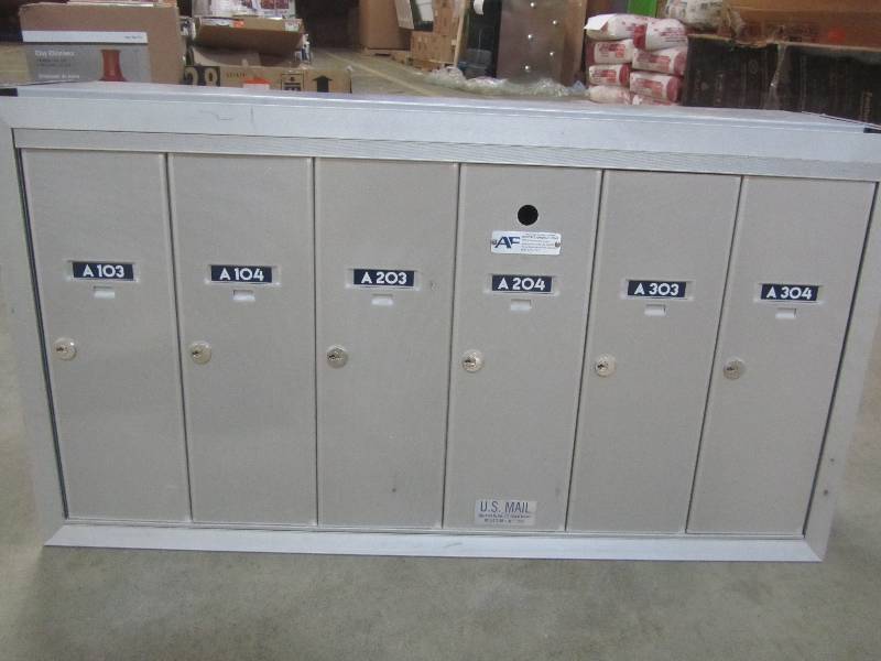 lot 64 image: Salsbury Industries Aluminum Surface-Mounted USPS Access Vertical Mailbox with 6 Doors