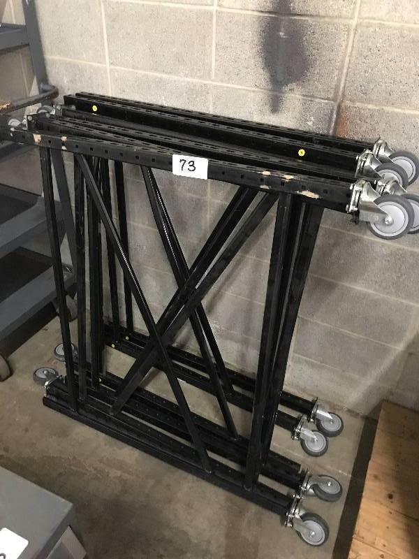 lot 73 image: SHORT PALLET RACKING SECTIONS ON WHEELS