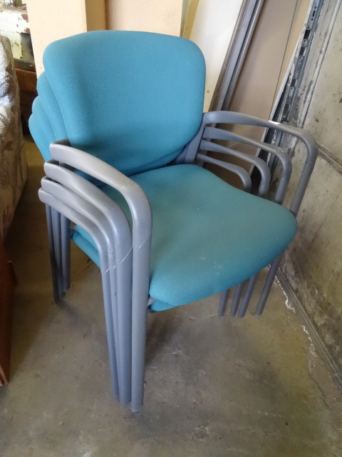 4 metal framed stacked chairs. Buye...