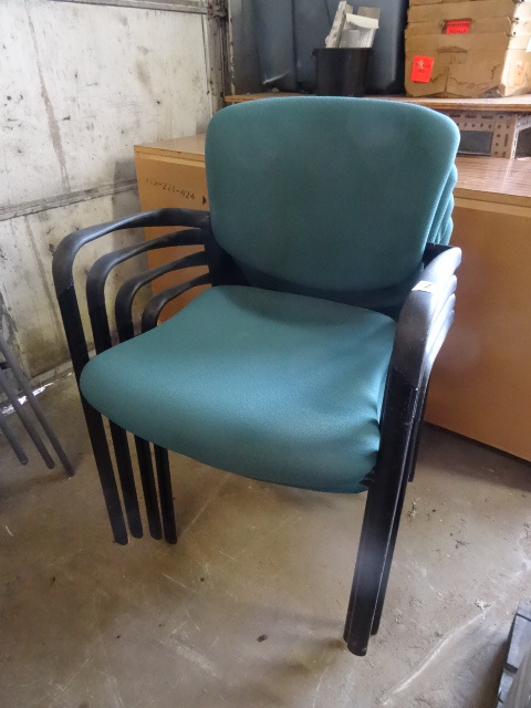 4 metal framed stacked chairs. Buye...