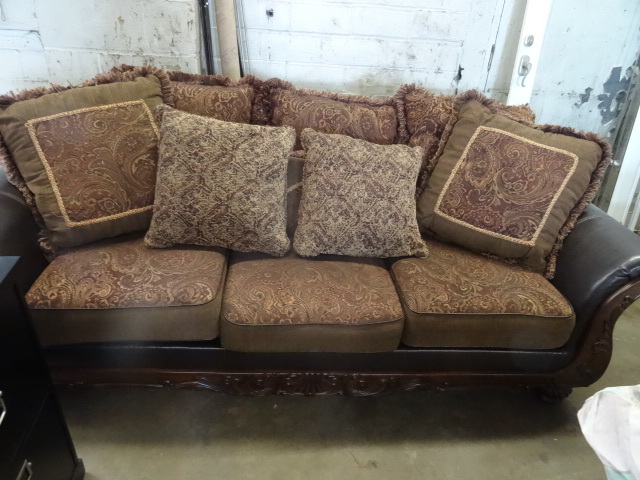 Leather and fabric couch. Very fanc...