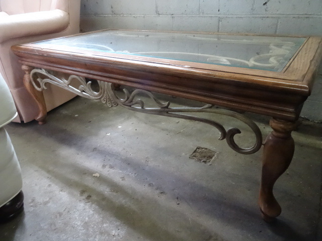 Glass top coffee table. 52 x 28 x 1...