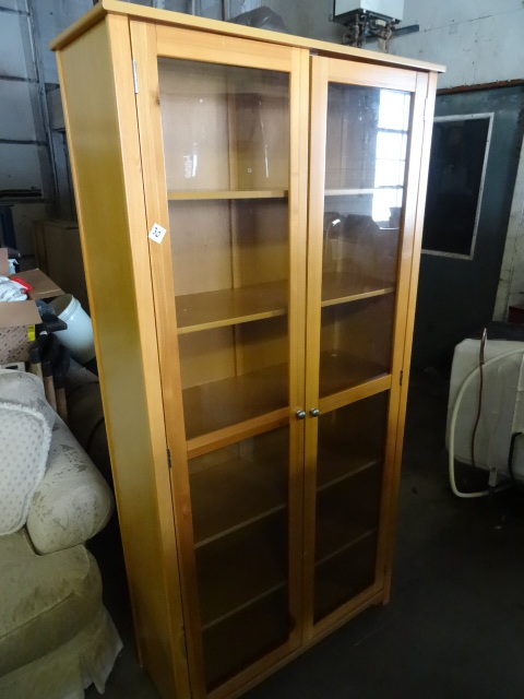 2 door curio cabinet. 36 x 13 x 72....