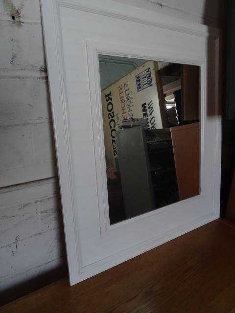 Wall hanging mirror. 33 x 37...