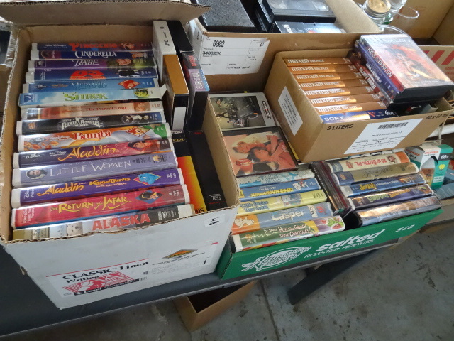 4 boxes of misc vhs tapes...