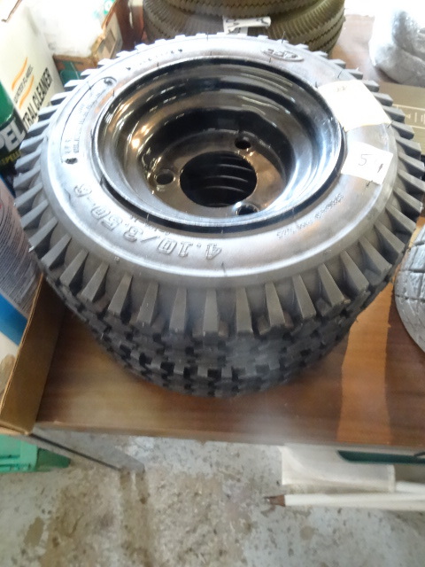 4.10  3.50- 6 solid filled tires. ...