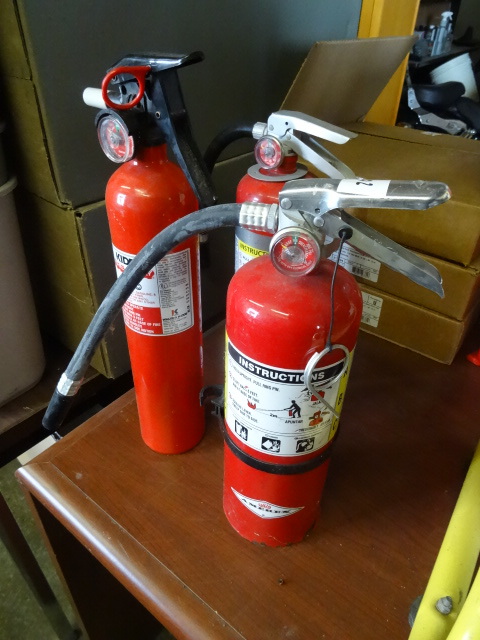 3 fire extinguishers. All are empty...