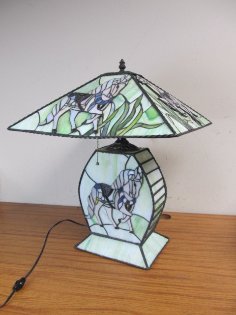 lot 25 image: StainedSlag Glass Carousel Horse Table Lamp