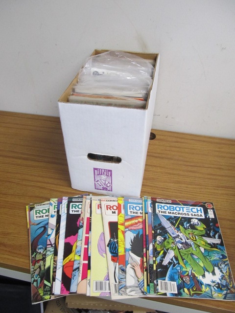 lot 49 image: Full Short Box of Approx 100 Comic Books