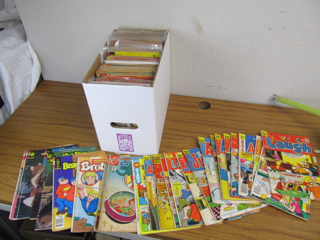 lot 94 image: Full Short Box of Approx 100 Comic Books