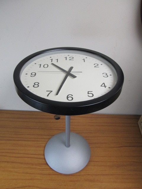 lot 123 image: Clock Cocktail Table