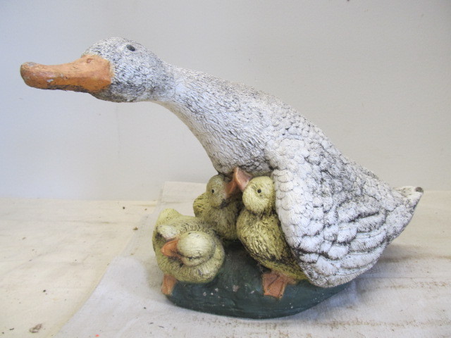 lot 156 image: Cement Goose wBabies Cement Lawn Statue