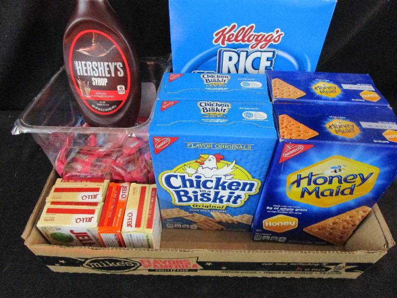 lot 13 image: Chicken in a Bisquit, Graham crackers, Chocolate Syrup, Taffy, Jello Shelf Pulled Candy