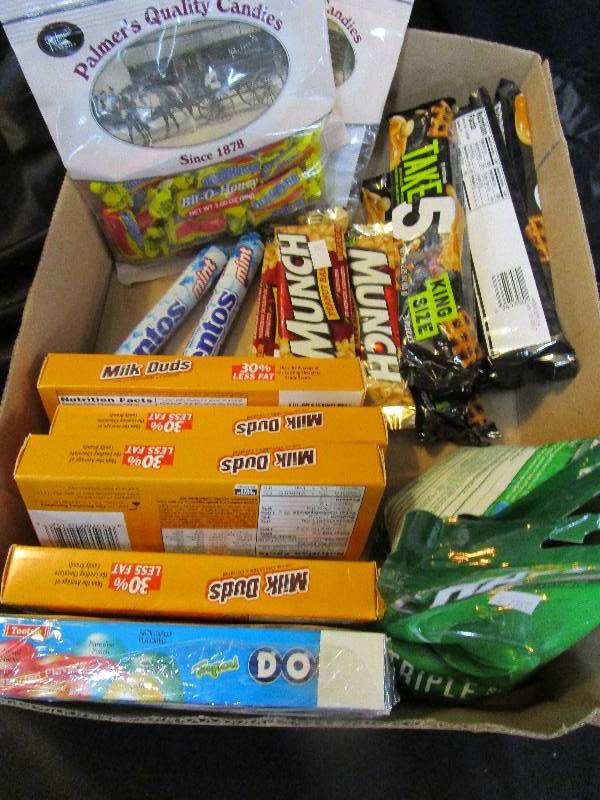 lot 51 image: Shelf Pulled Candy Bitto Honey, Milk Duds and more