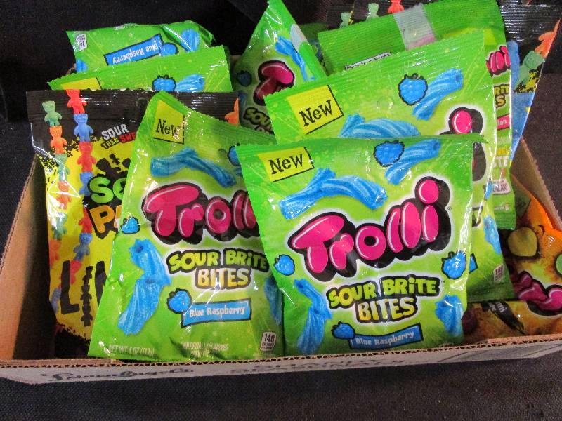 lot 74 image: Shelf Pulled Candy Sour Patch and trolls