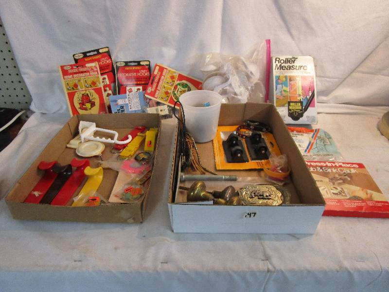 lot 135 image: Bolo Ties, Old Door Knob, Various Kitchen Hooks and Belt Buckle
