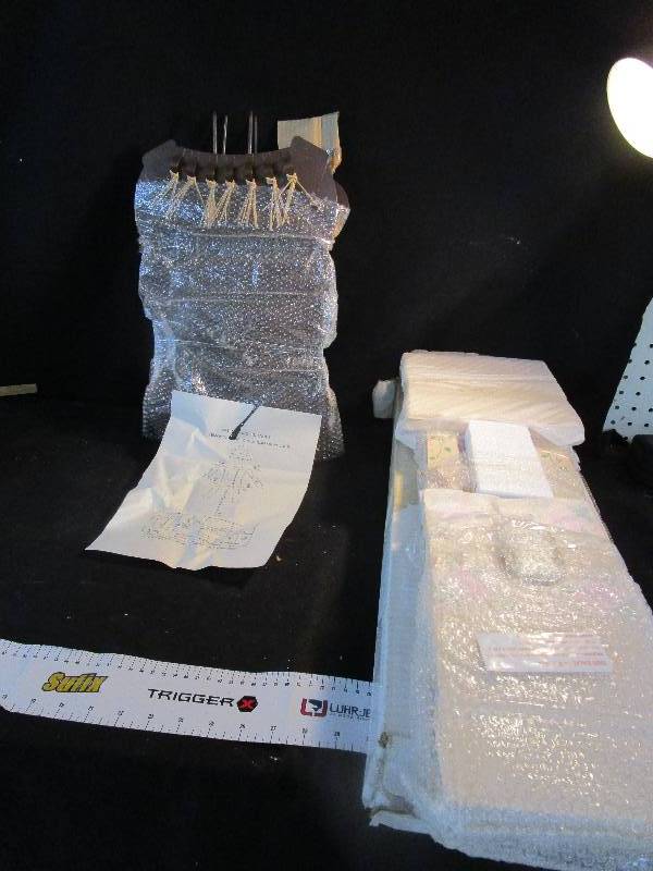 lot 140 image: Never Used Tissue Toilet Paper Keeper and Scarecrow Pumpkin Holder Metal