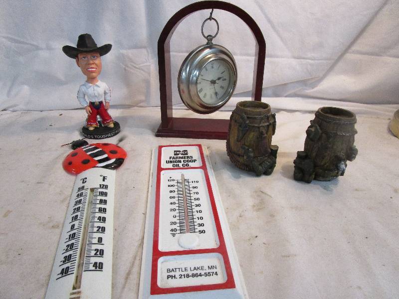 lot 150 image: Bobble Head, Barrel Dcor, Thermometers and a clock