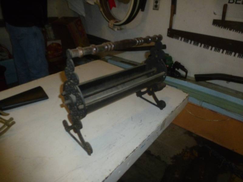 Antique News Paper Roller