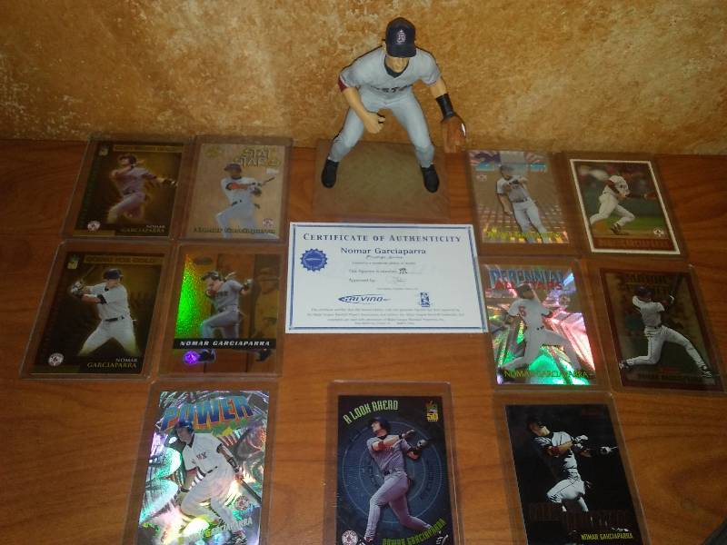 lot 14 image: Nomar Garciaparra Salvino statue and 11 cards.