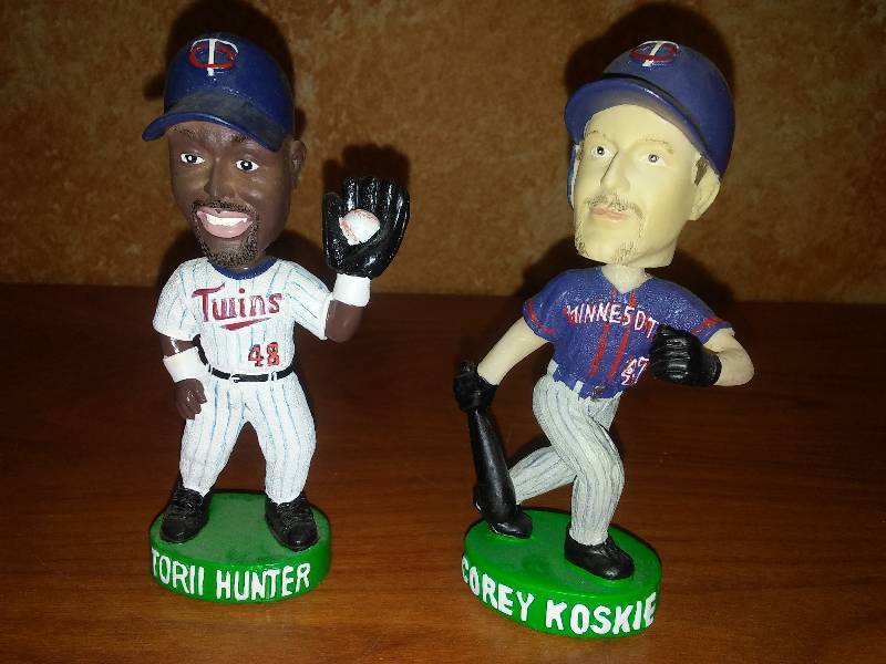 lot 27 image: Torii Hunter and Corey Koskie Bobbleheads.